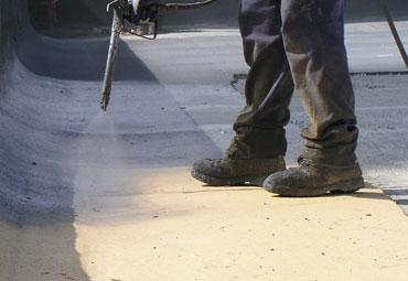 Coating systems over Chattanooga spray foam roof systems